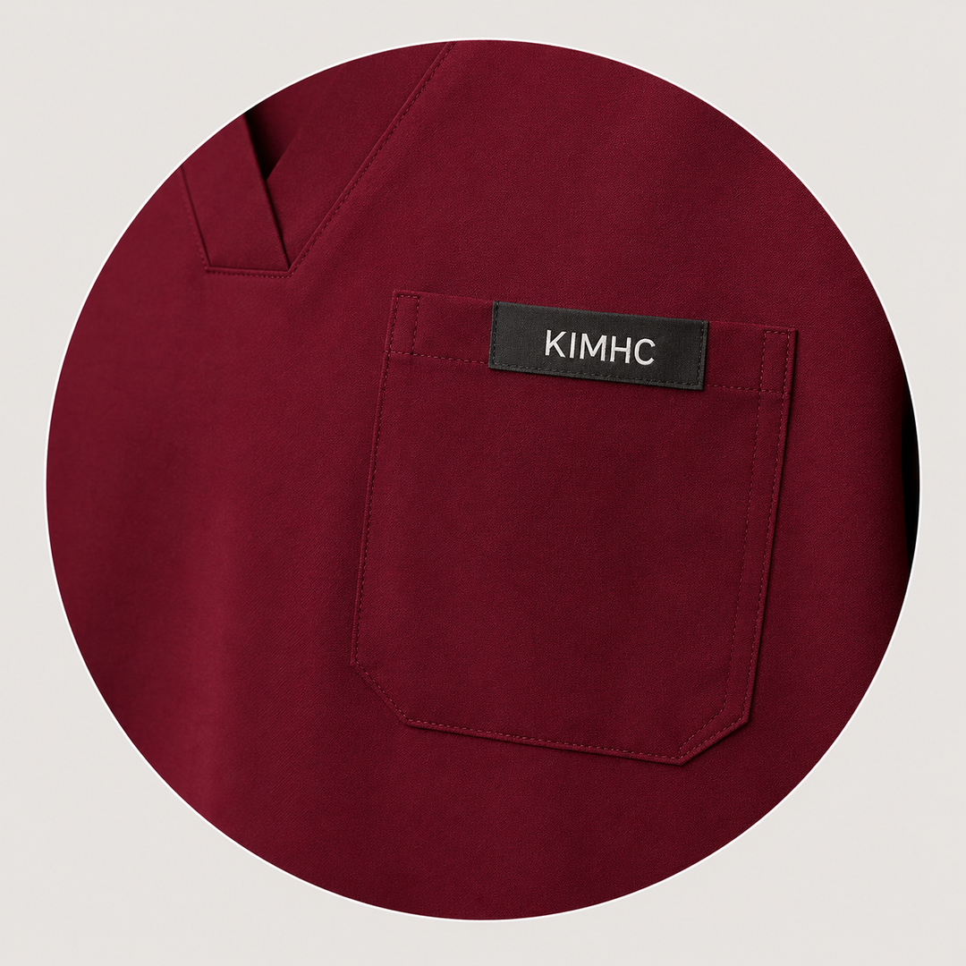 The Vital Jogger in Bloodline Burgundy — one chest pocket with woven KIMHC tag