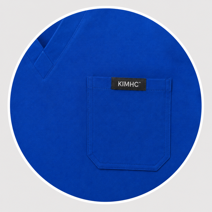 The Vital Jogger in Code Blue — one chest pocket with woven KIMHC tag