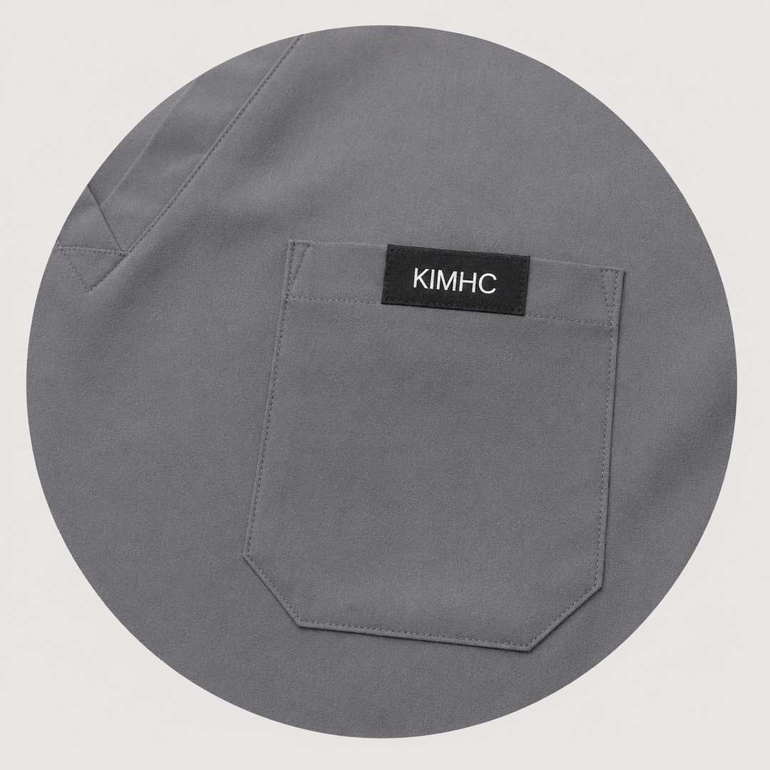 The Vital Jogger in MRI Gray — one chest pocket with woven KIMHC tag