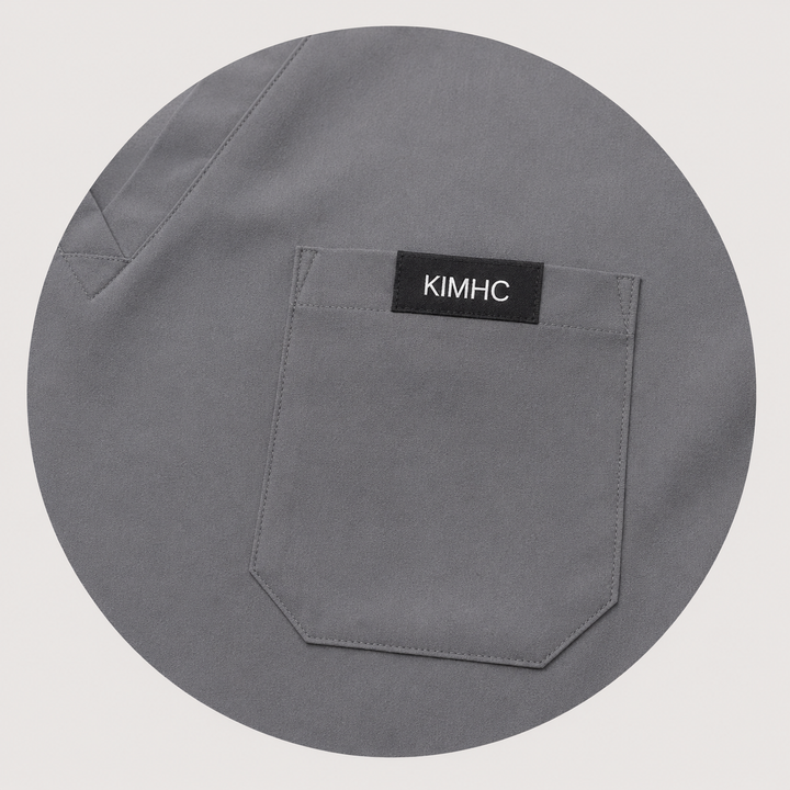 The Vital Jogger in MRI Gray — one chest pocket with woven KIMHC tag