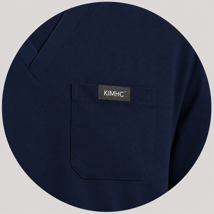 The Vital Jogger in Navy Nerves — one chest pocket with woven KIMHC tag