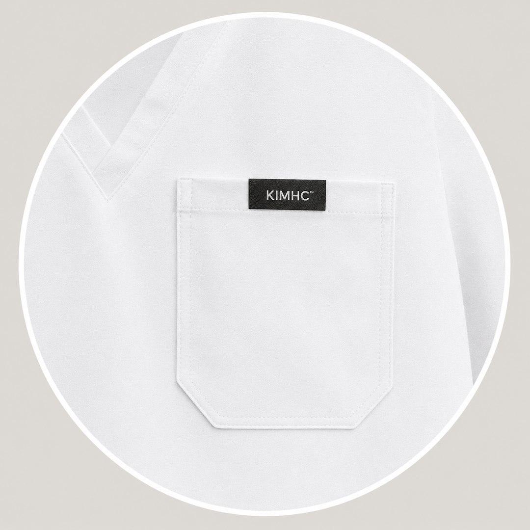 The Vital Jogger in Sterile White — one chest pocket with woven KIMHC tag