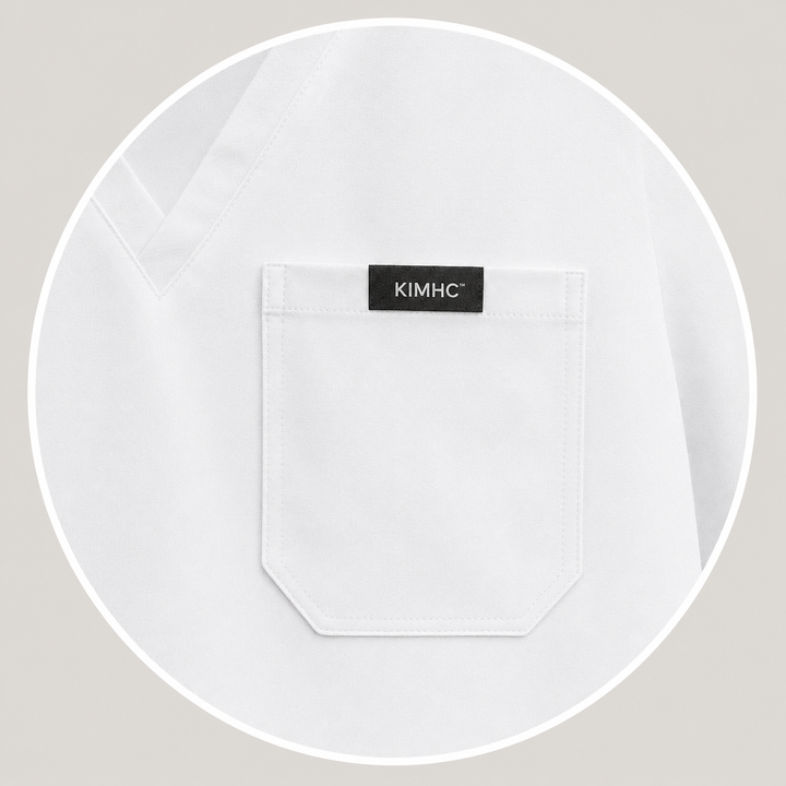 The Vital Jogger in Sterile White — one chest pocket with woven KIMHC tag