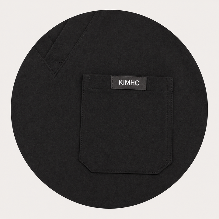 The Vital Jogger in X-Ray Black — one chest pocket with woven KIMHC tag